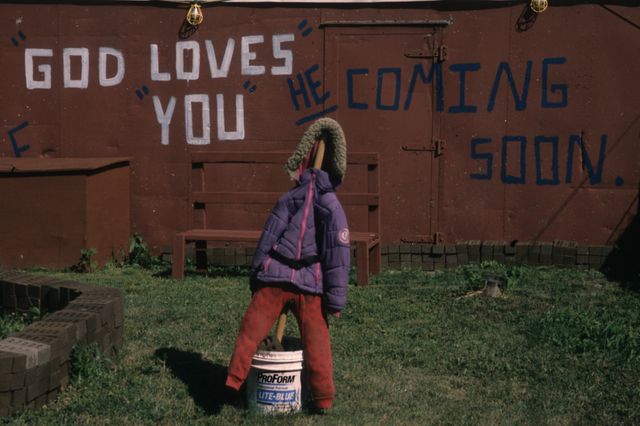 A photo of a strange "God Loves You" sign on Staten Island